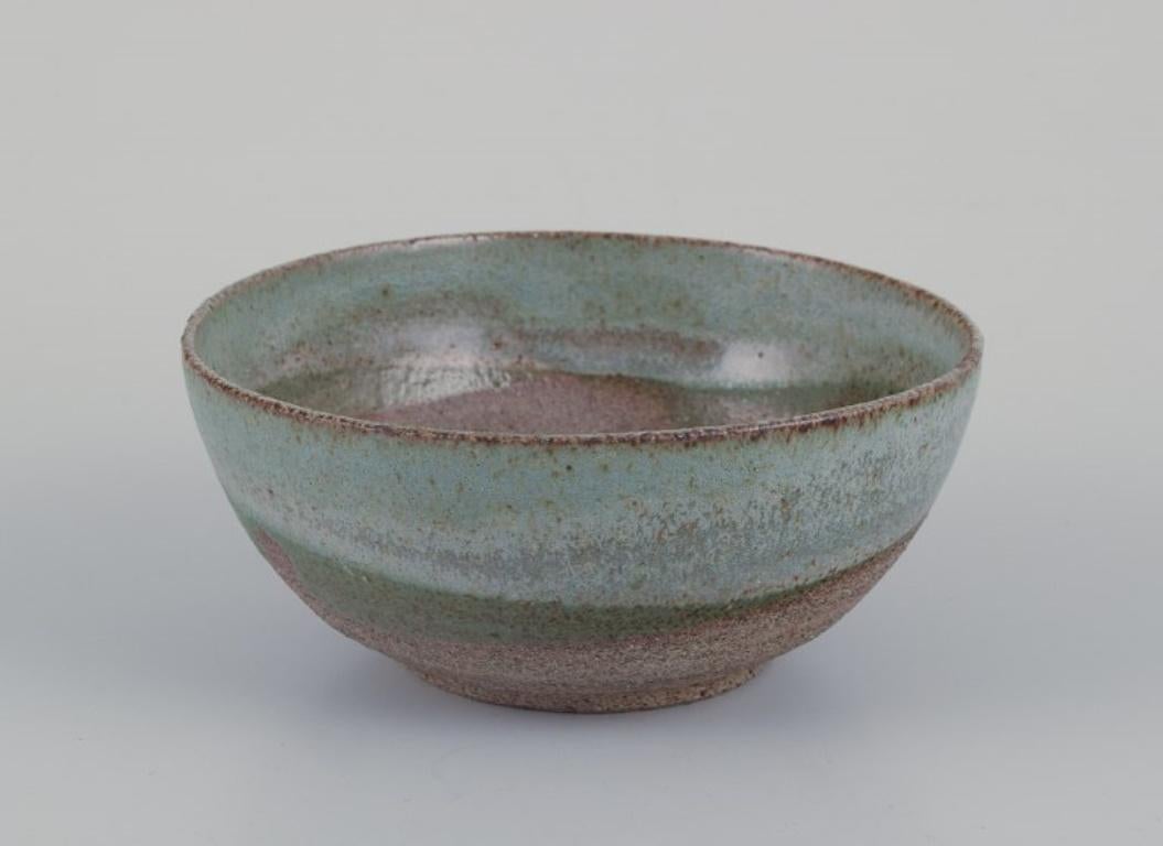 European studio ceramicist, unique ceramic bowl and ceramic vase.
Ca. 1980s.
Indistinctly marked.
Perfect condition.
Bowl: D 11.0 cm x H 4.8 cm.