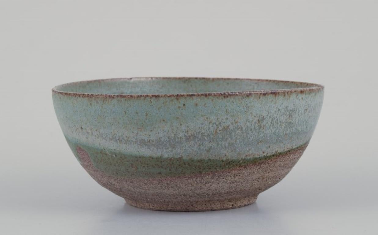 Unknown European studio ceramicist. Unique ceramic bowl and ceramic vase. Ca. 1980s For Sale