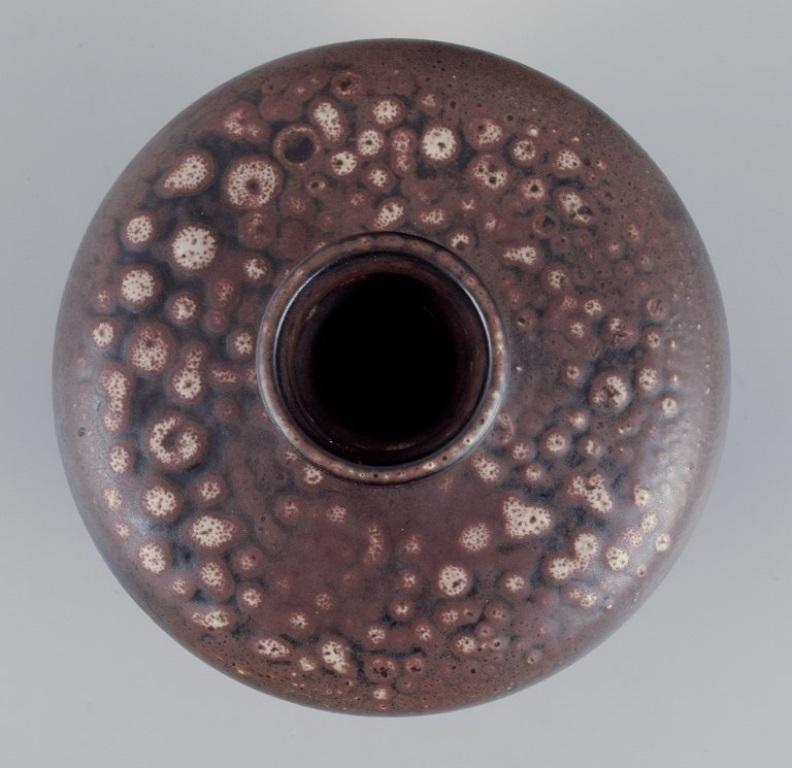 Glazed European studio ceramicist. Unique ceramic vase. Glaze in brown tones. Ca. 1980s For Sale