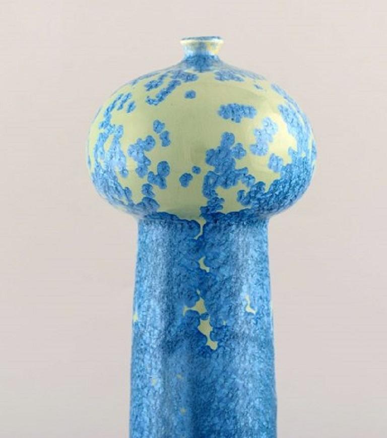European studio ceramicist. Unique vase in glazed ceramics. Beautiful glaze in turquoise shades, 1980s.
Measures: 27.5 x 9 cm.
In very good condition.