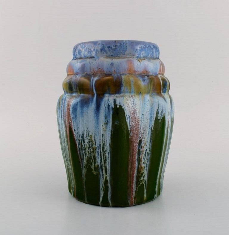 European studio ceramicist. Unique vase in glazed ceramics. Beautiful polychrome running glaze. Mid-20th century.
Measures: 19 x 15 cm.
In excellent condition.