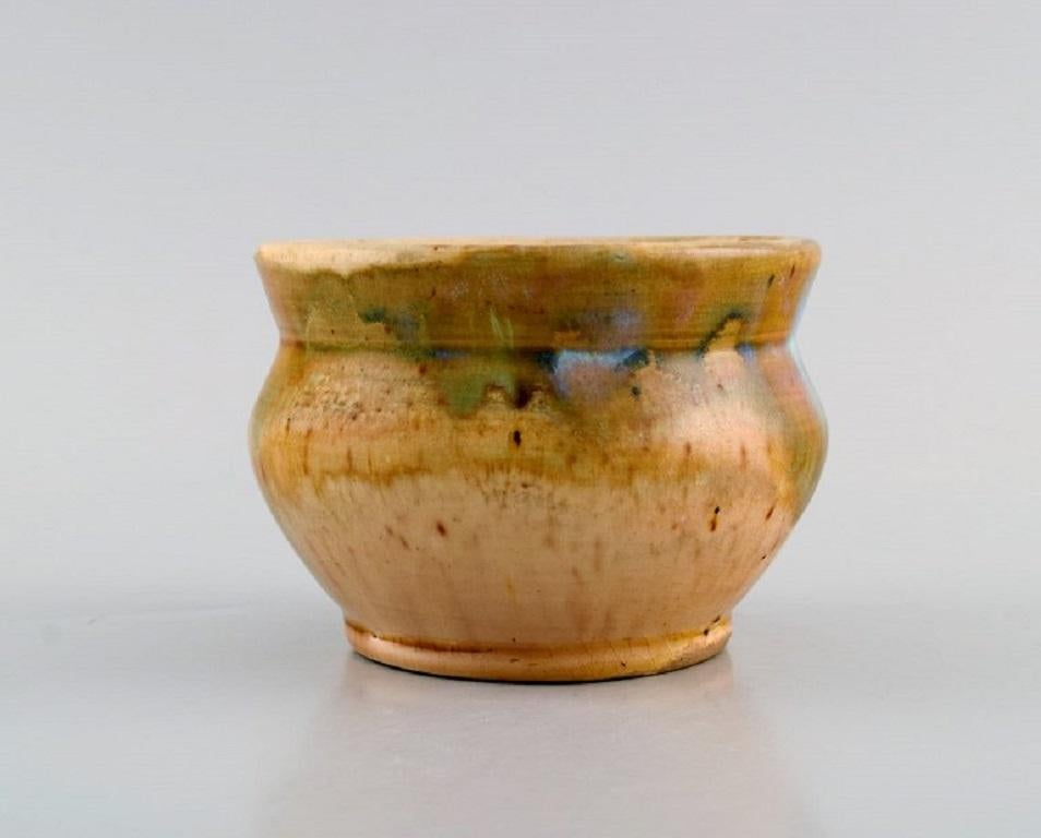 European studio ceramicist. Unique vase in glazed ceramics. B
Beautiful glaze in sand shades. Mid-20th century.
Measures: 11 x 7.5 cm.
In excellent condition.