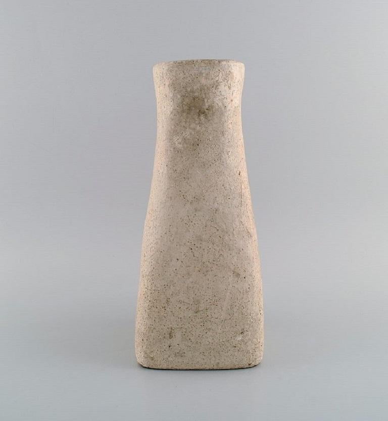 European studio ceramicist. Unique vase in glazed stoneware. 
Beautiful raw glaze in sand shades. 1960s / 70s.
Measures: 30.5 x 14.5 cm.
In excellent condition.
Signed.
