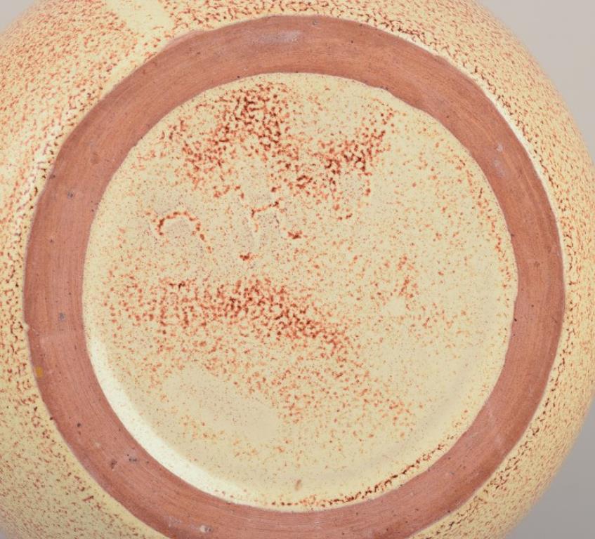 Late 20th Century European Studio Ceramist. Ceramic vase in round shape. 1980s For Sale
