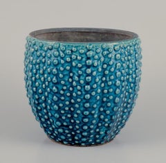 European studio ceramist. Large ceramic flower pot holder. Turquoise glaze.