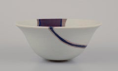 European studio ceramist, unique ceramic bowl. Iron glaze. Late 20th C.