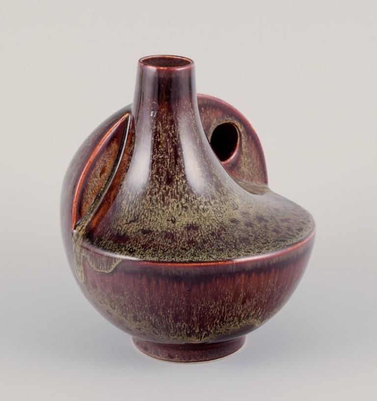 Unknown European studio ceramist. Unique ceramic vase with speckled glaze in brown tones For Sale