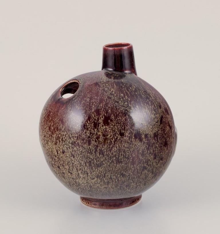 Glazed European studio ceramist. Unique ceramic vase with speckled glaze in brown tones For Sale