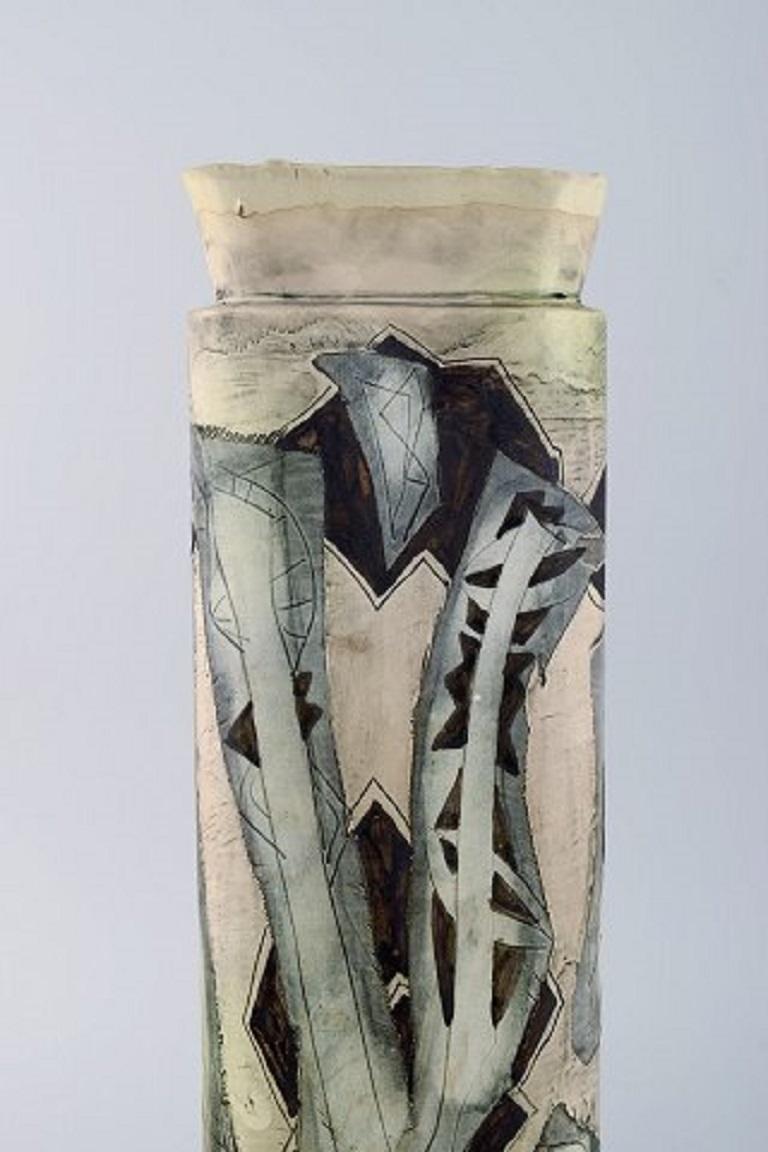 European studio ceramist. Unique vase in glazed pottery with hand painted abstract motifs, 1960s-1970s.
Measures: 37.5 x 12.5 cm
In excellent condition.
Signed.