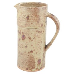 European studio potter. Stoneware pitcher with rustic glaze, 1980s