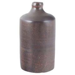 European studio potter. Tall cylindrical vase with deep violet glaze.