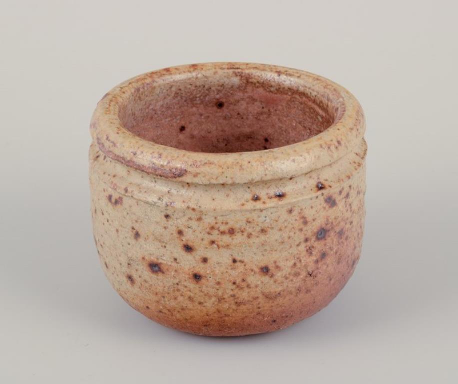 Glazed European studio potter. Two unique ceramic jars, one with a lid. For Sale
