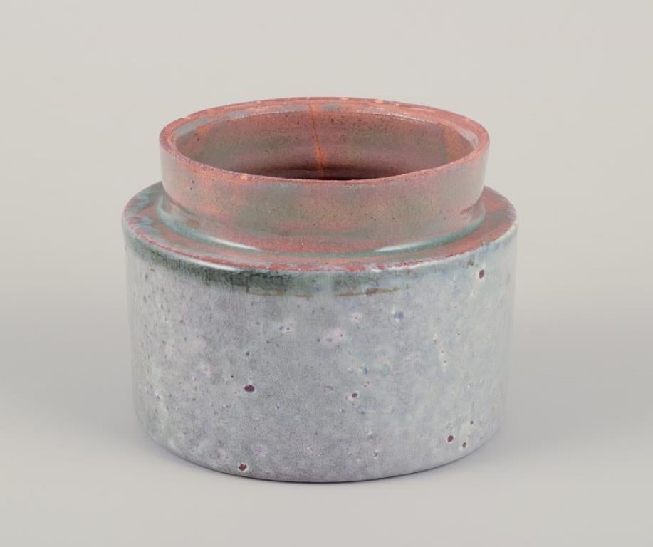 Late 20th Century European studio potter. Two unique ceramic jars, one with a lid. For Sale