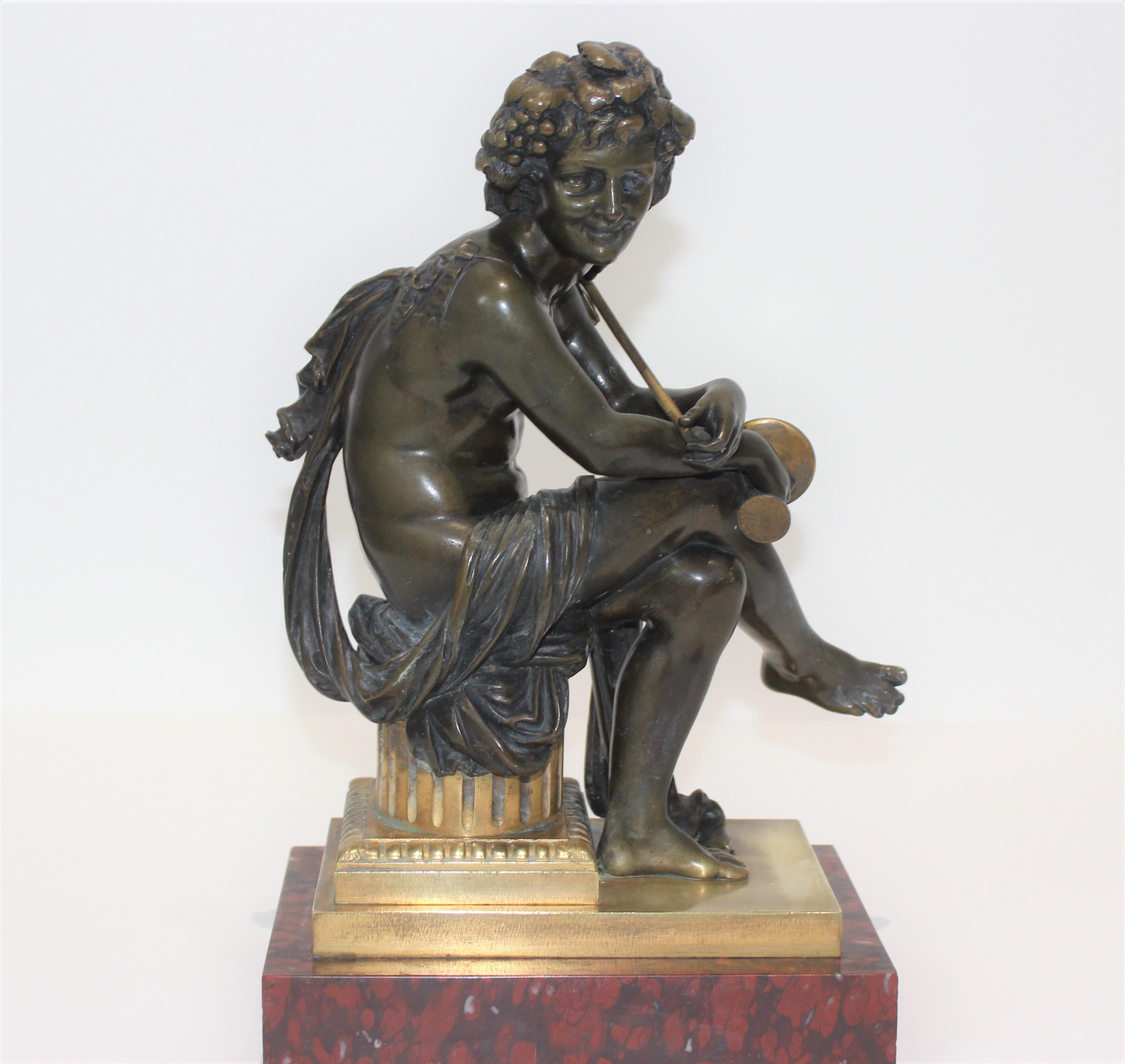 European tour bacchus bronze sculpture on gilt and rouge Royale marble base from a palm beach estate

Note the refinement of the fingers and toes.