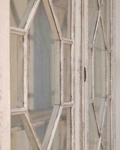 European two-part vitrine cabinet with fine carvings, circa 1790
