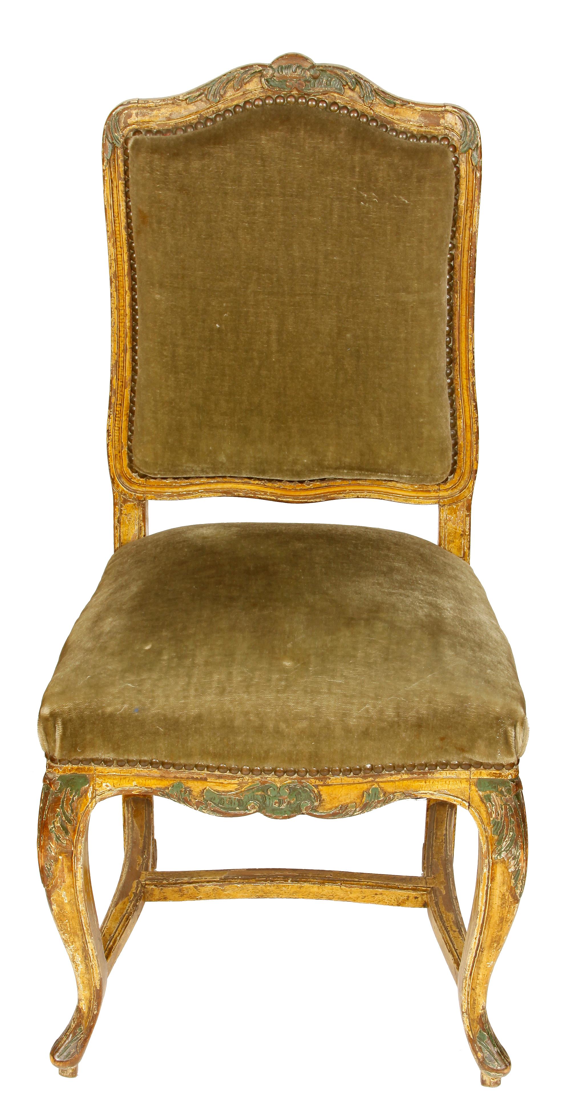 European side chair upholstered in green velvet with carved back, curved legs and stretchers in Louis XIV style.