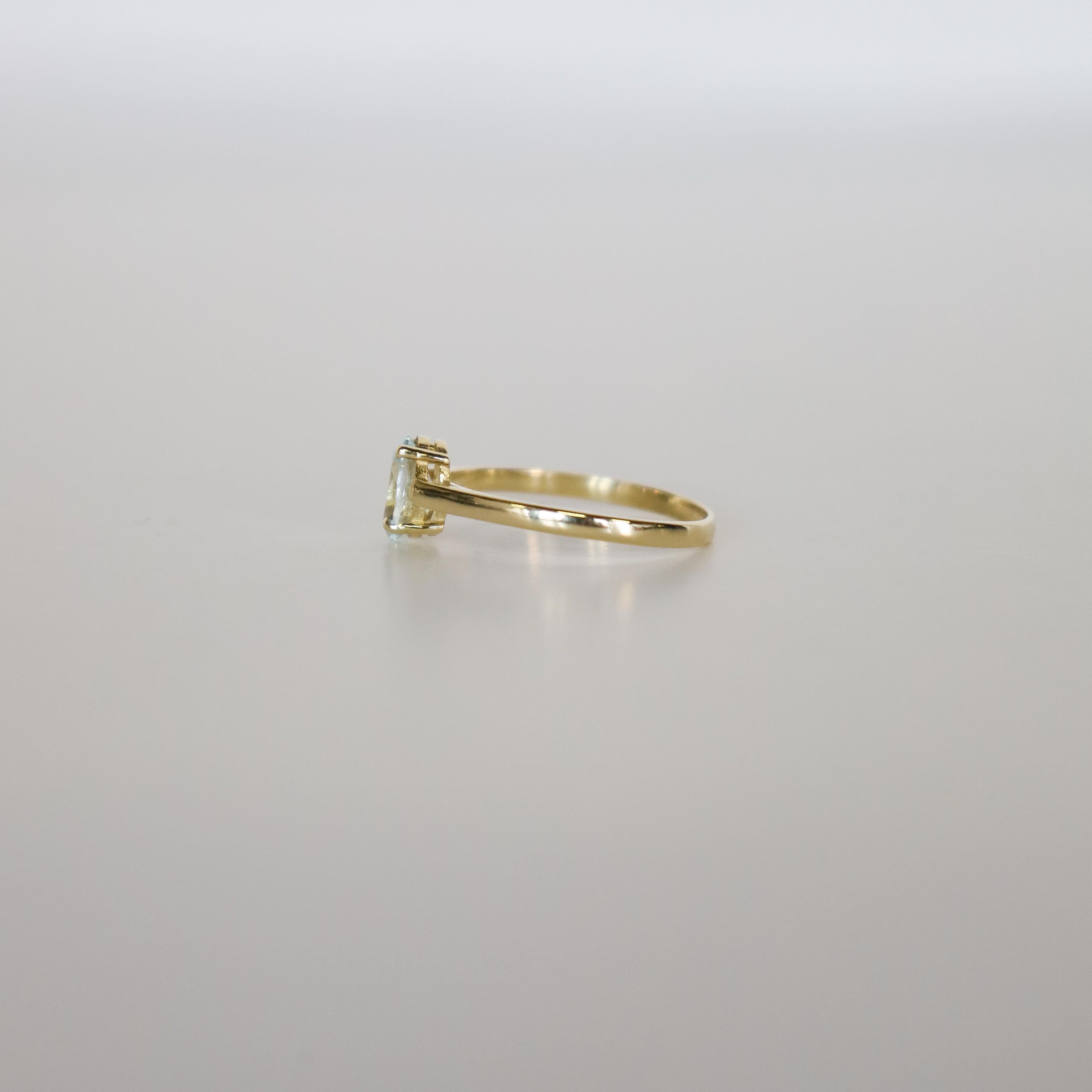 Oval Cut 14k Yellow Gold Solitaire Ring with Oval Brilliant-Cut Aquamarine