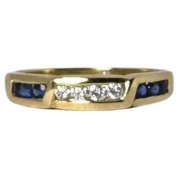 European vintage ring 14 carat yellow gold with diamonds and blue sapphires For Sale