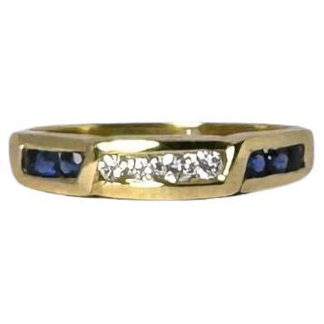 European vintage ring 18 carat gold with brilliant diamonds and blue sapphires