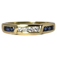 European Retro ring 14 carat yellow gold with diamonds and blue sapphires
