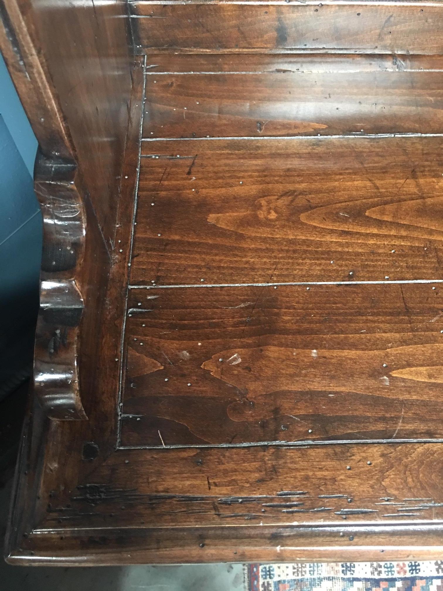 Oversized hutch in walnut stain. In amazing condition. All cabinets or drawers open except for the bottom center cabinet. Brass hardware.