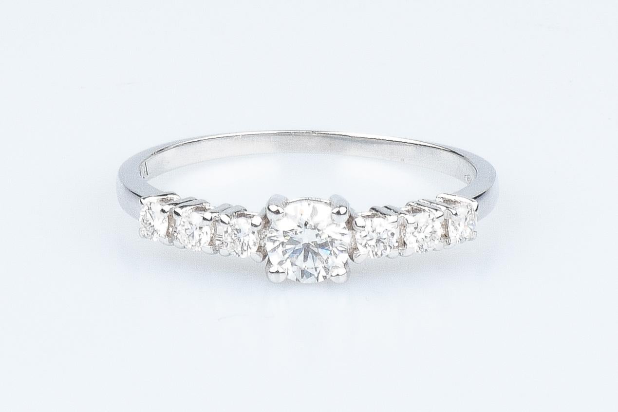 Women's EVA certified Luna 0.68 carat round brillant synthetic diamond white gold ring For Sale