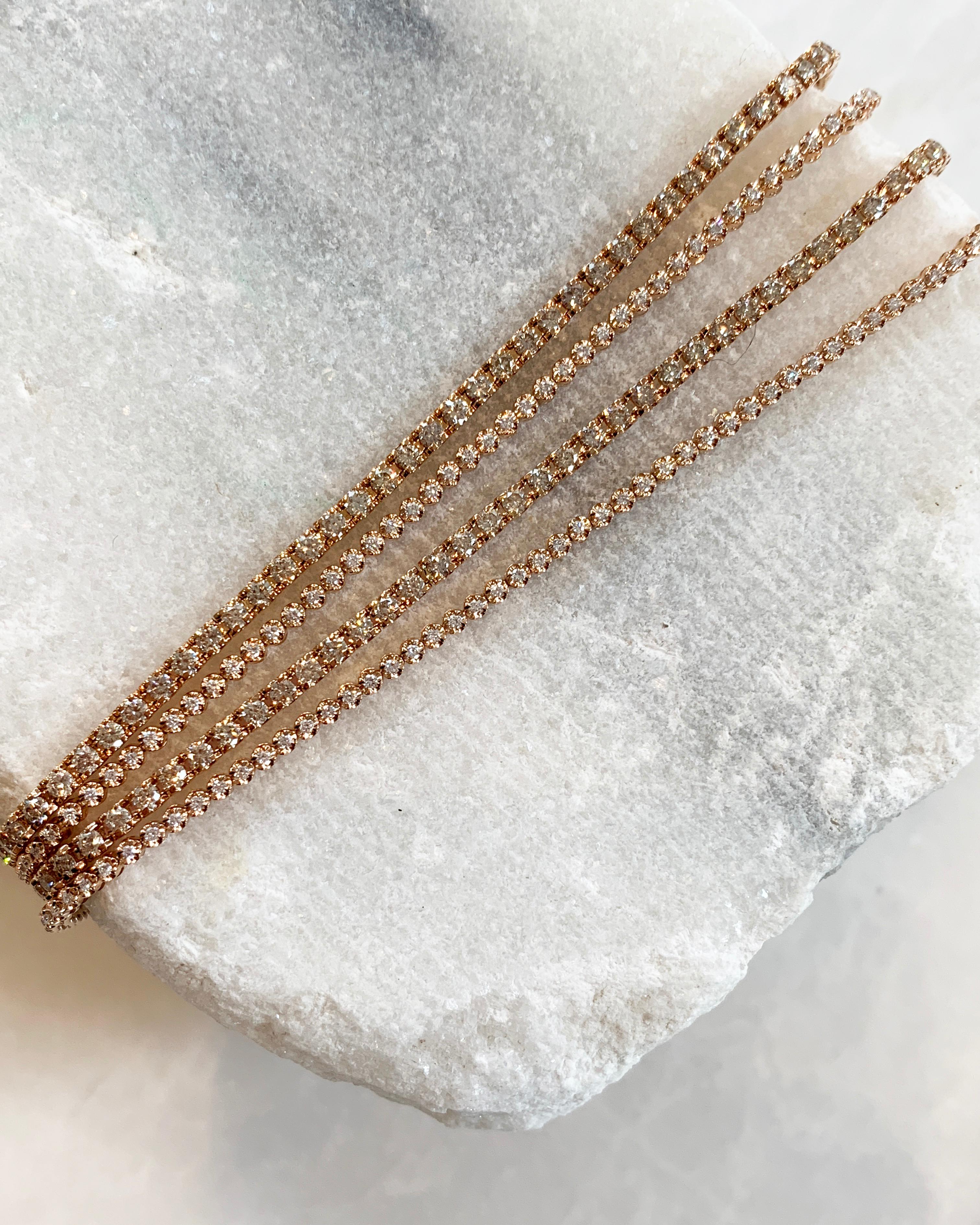 18K Rose Gold Tennis Bracelet with 2.30ct Pale Champagne Diamonds 

This bracelet is 6.5 inches but can be ordered in additional lengths.  This style also comes in additional gold and diamond varieties, please inquire for other versions. 

Eva