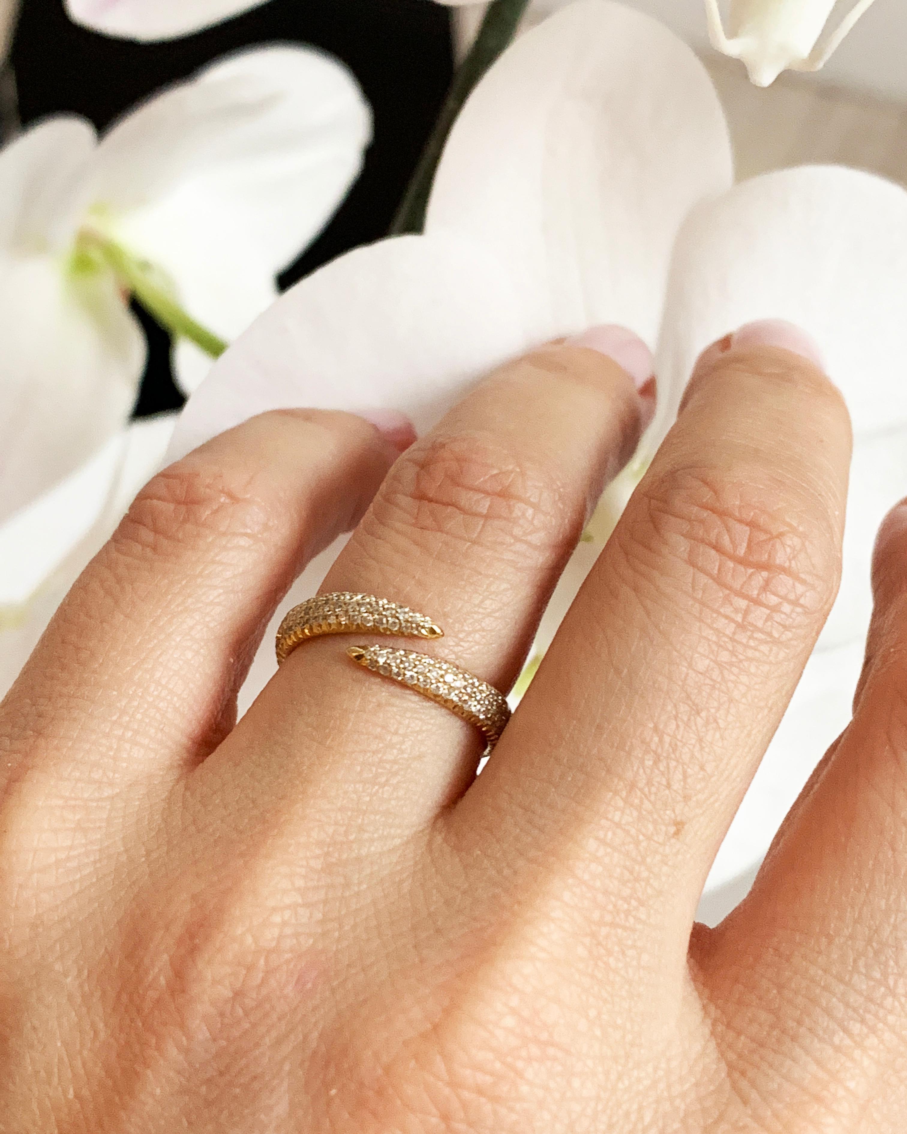 18K Yellow Gold with Pale Champagne Diamonds - Size 3.5.

Additional sizes are available and this ring can be made to order in any size. This ring can be worn on any finger and is most commonly worn as a pinky or midi-ring. This style also comes in