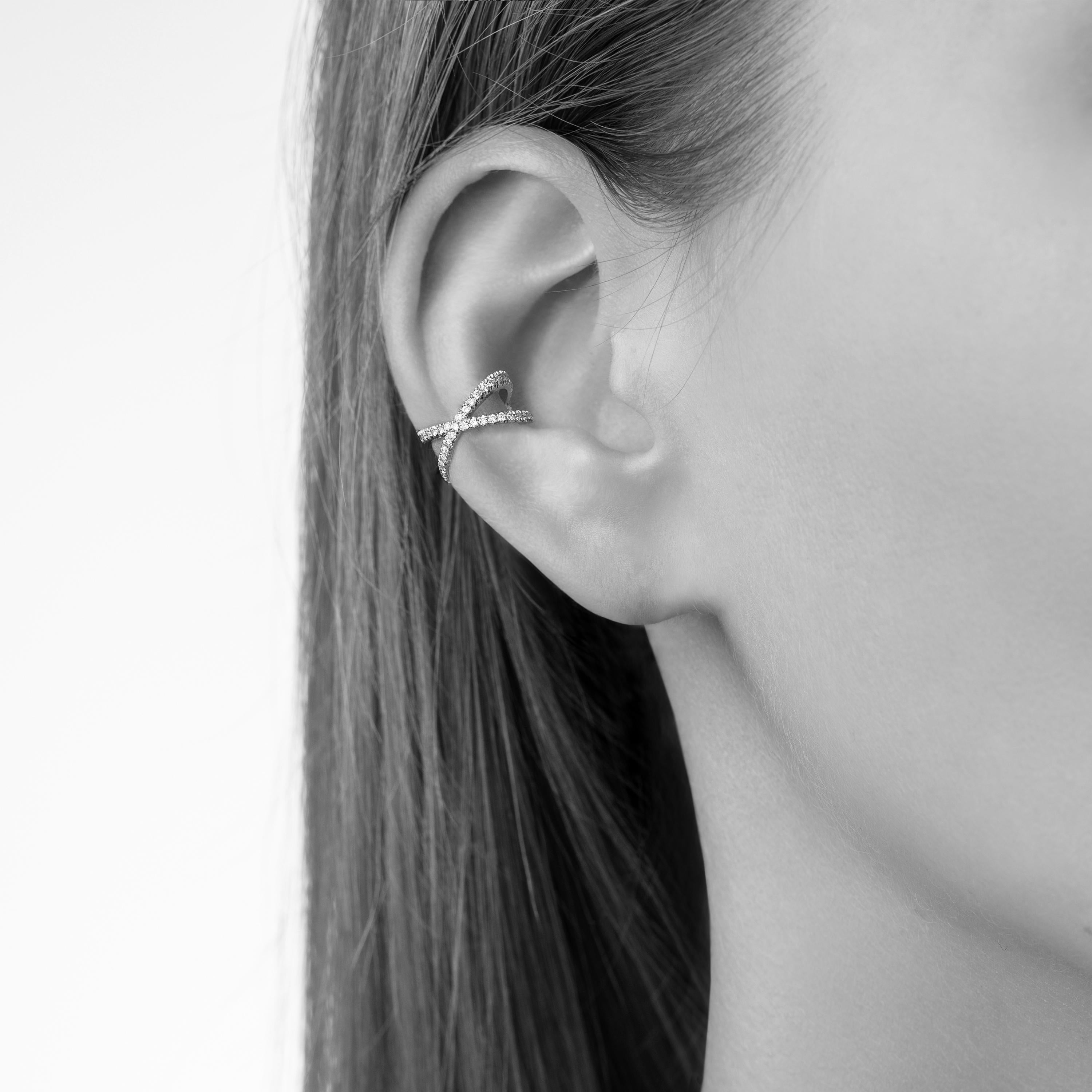 18K Blackened White Gold Ear Cuff with Black Diamonds

The Eva Fehren design aesthetic allows women to build looks that are personally relevant and unique to them. A collection that possesses bold femininity while remaining iconic and modern.  Known