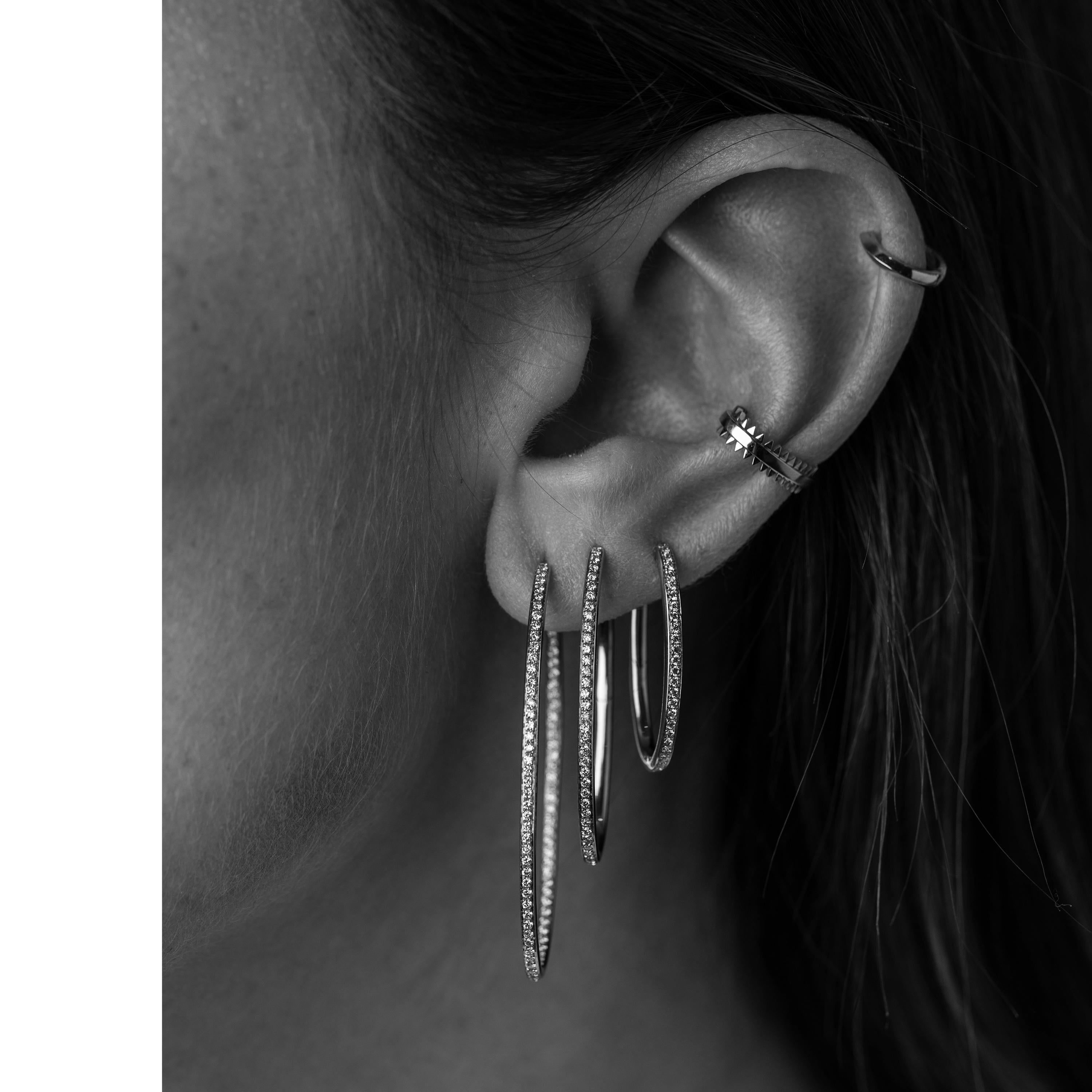 18K Blackened White Gold Ear Cuff with White Diamonds

The Eva Fehren design aesthetic allows women to build looks that are personally relevant and unique to them. A collection that possesses bold femininity while remaining iconic and modern.  Known