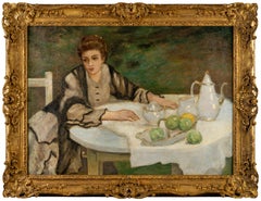 Donna seduta per il tè