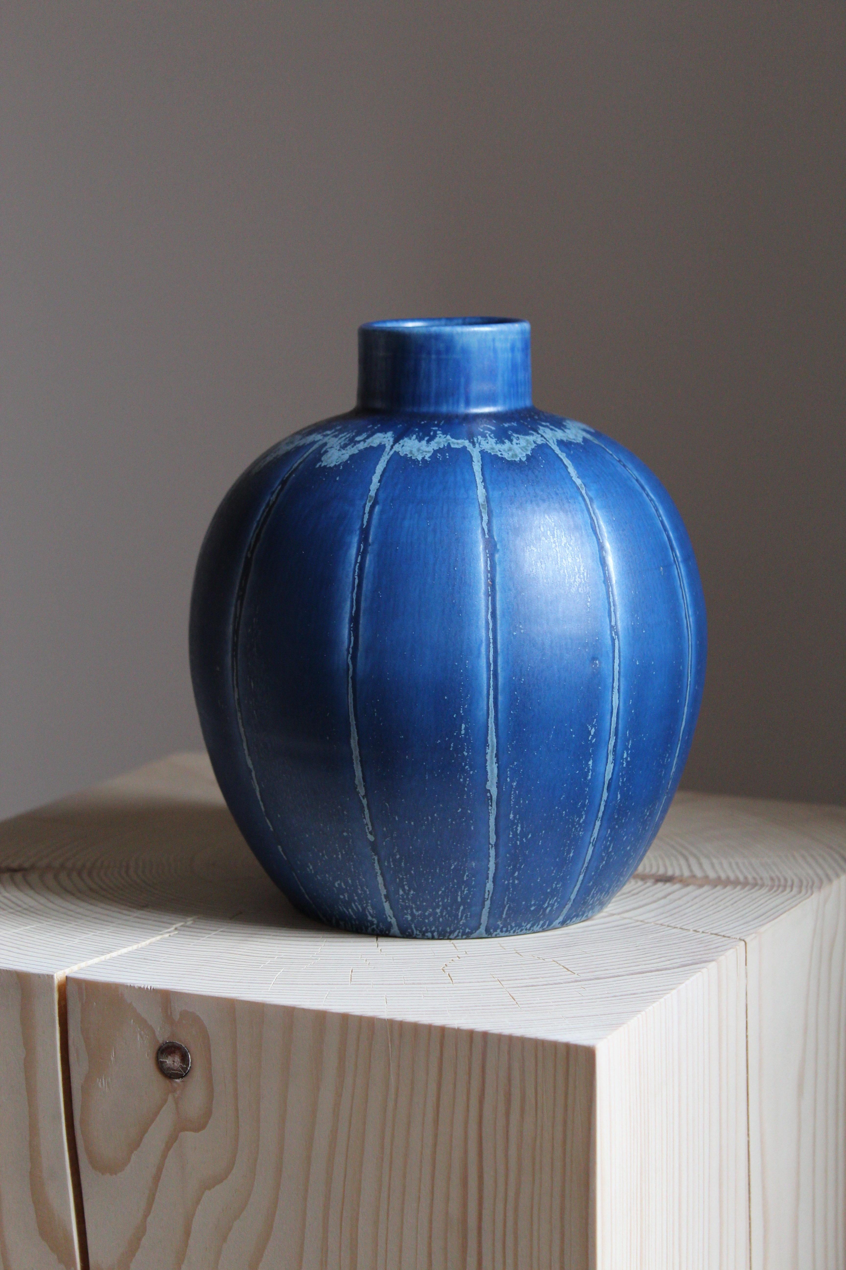 An early modernist vase. Designed by Eva Jancke Björk, for Bo Fajans, Sweden, 1940s.

Stamped.

Other designers of the period include Ettore Sottsass, Carl Harry Stålhane, Lisa Larsson, Axel Salto, and Arne Bang.