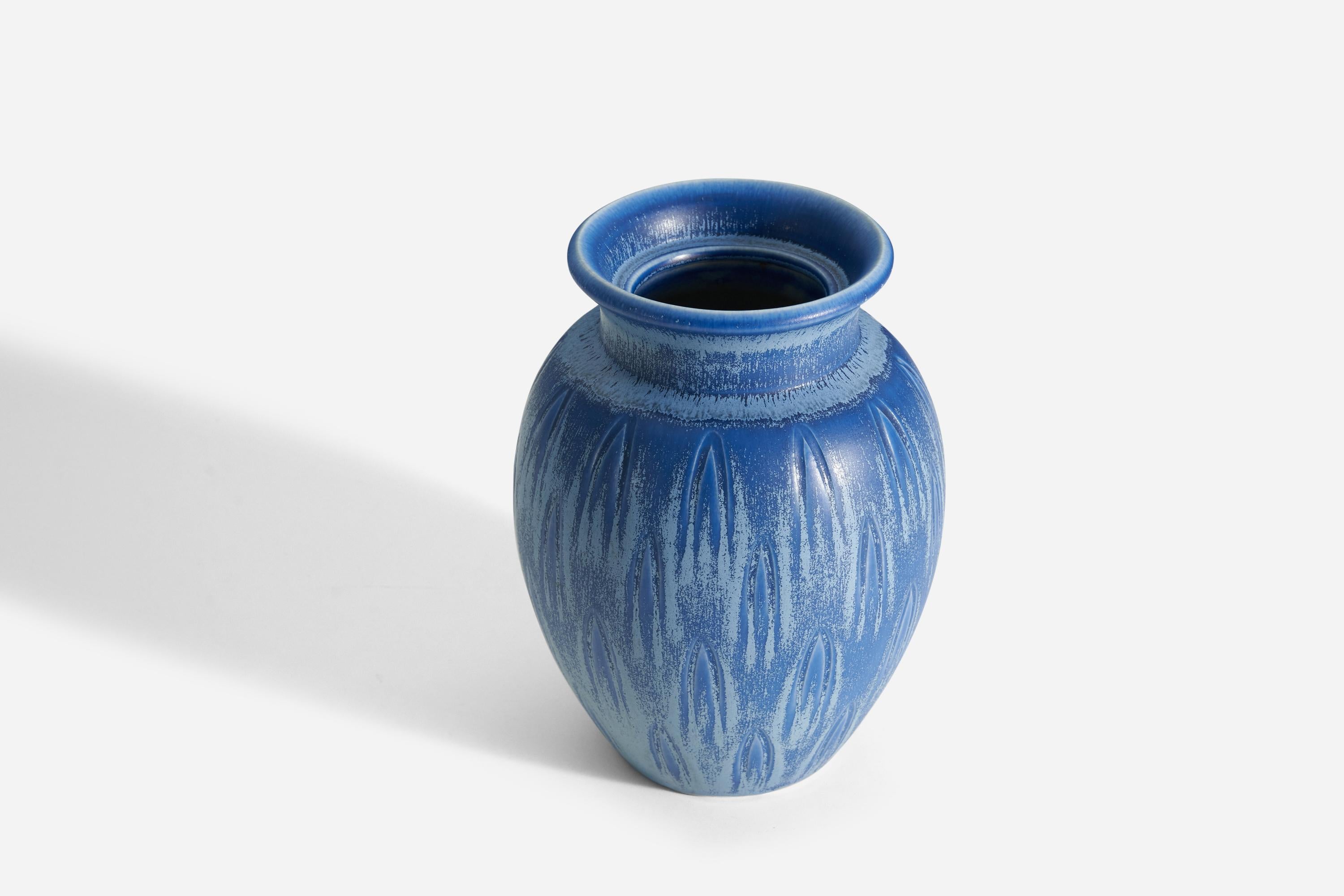 A blue glazed earthenware vase designed by Eva Jancke Björk, for Bo Fajans, Sweden, 1940s. Stamped on the underside of the vase.