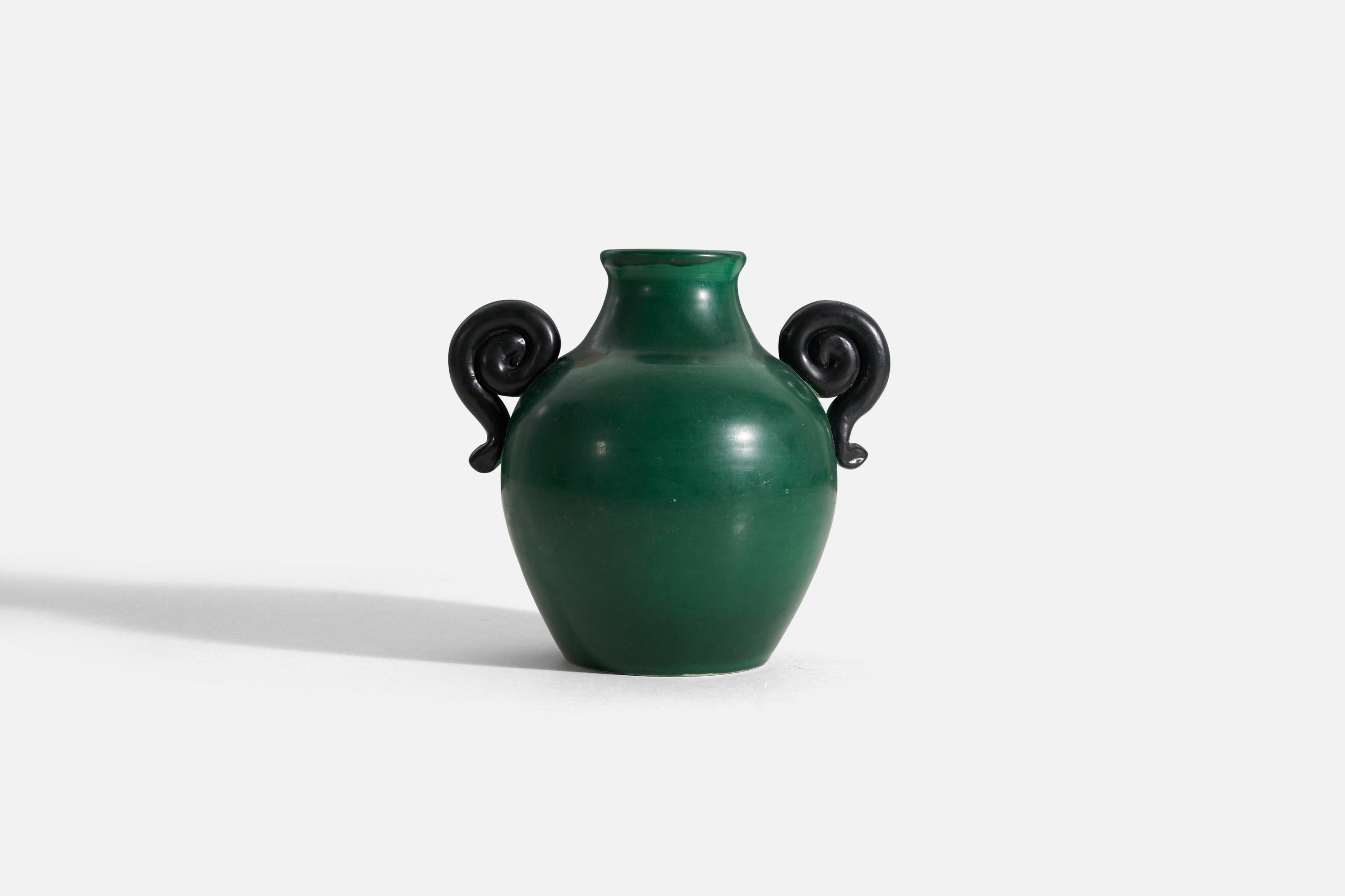 A green glazed early modernist vase with spiral handles designed by Eva Jancke Björk, for Bo Fajans, Sweden, 1940s. Stamped on bottom.
 