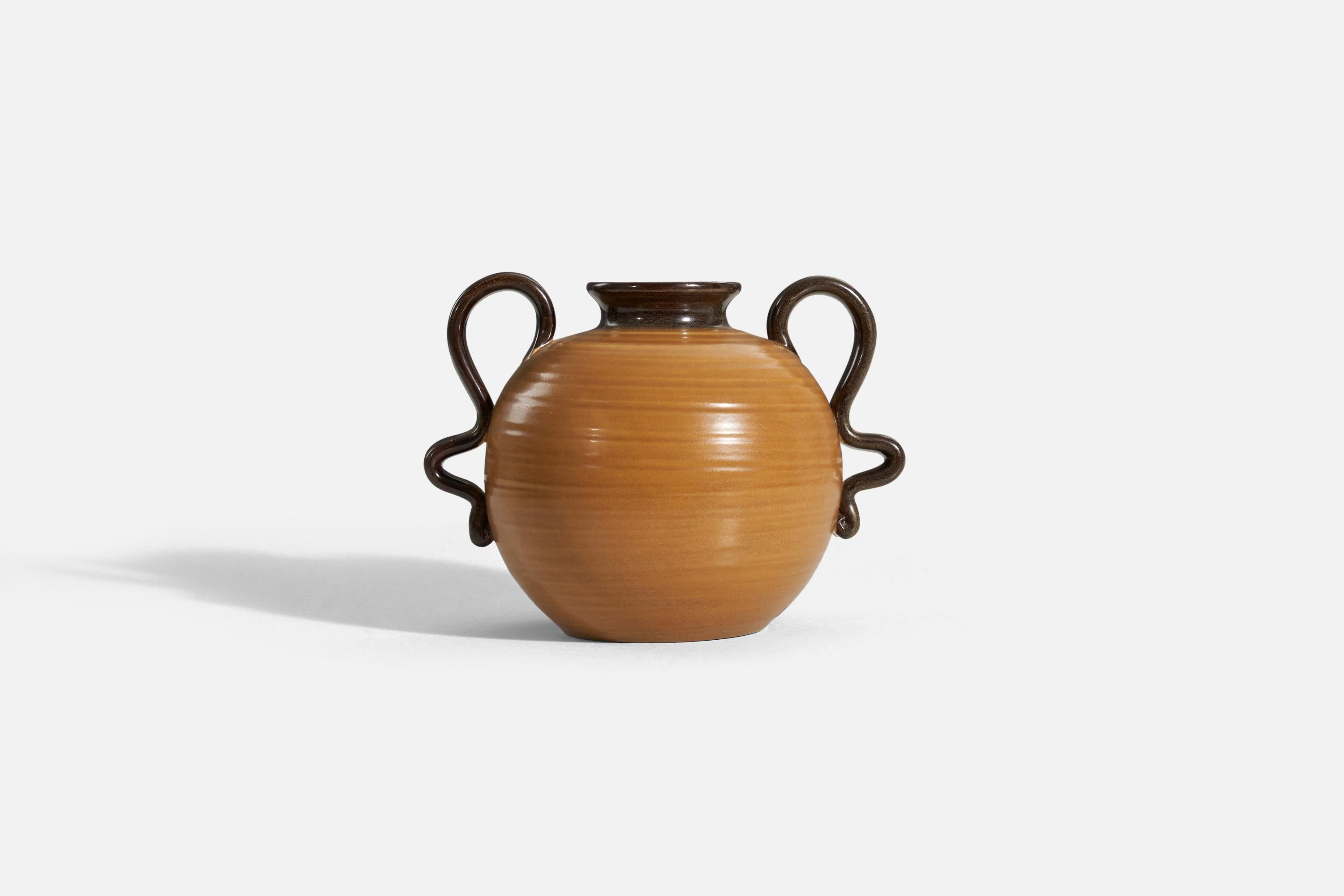A caramel brown, glazed stoneware vase designed by Eva Jancke Björk and produced by Bo Fajans Gefle, Sweden, 1940s.

