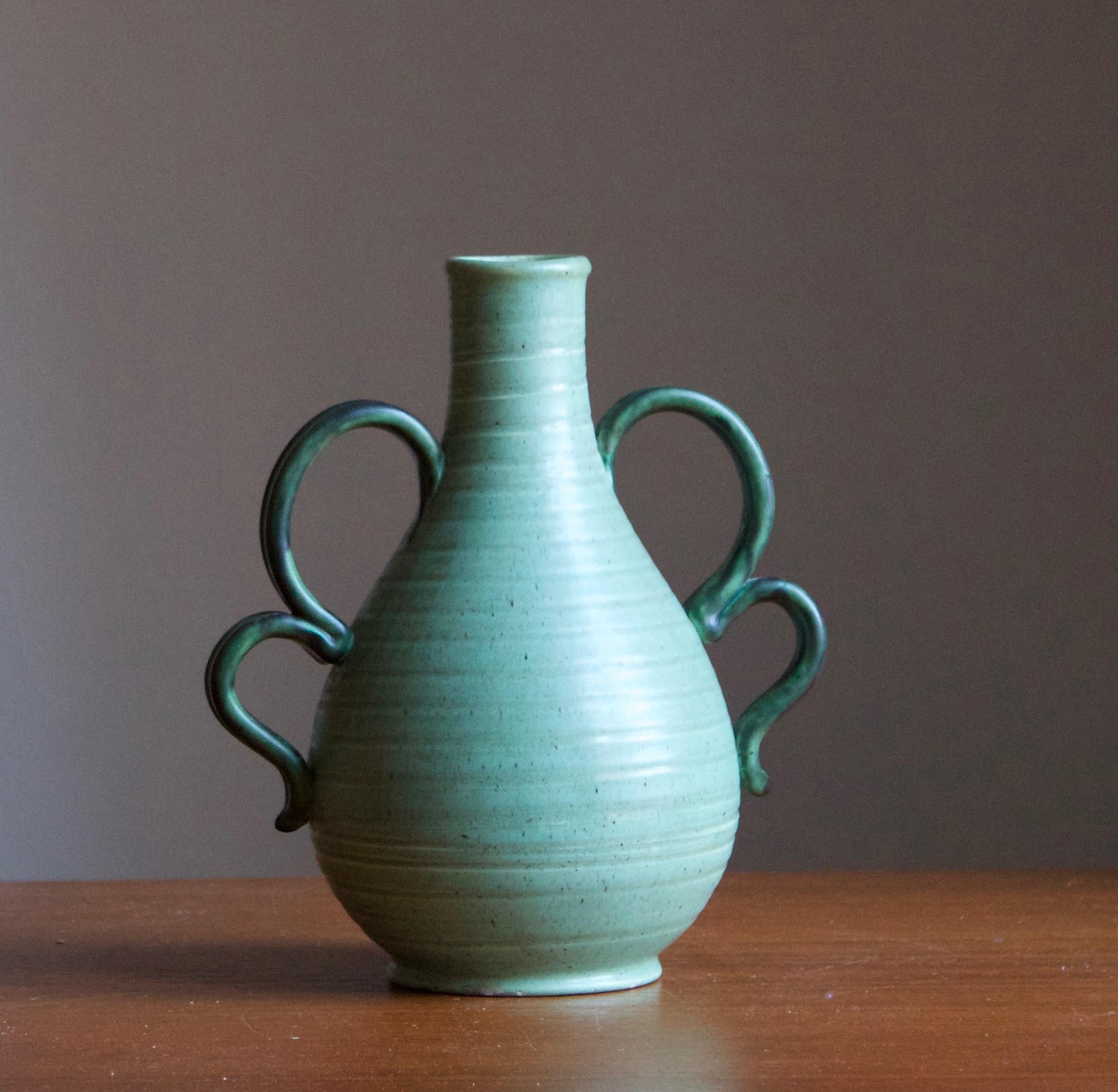 An early modernist vase. Designed by Eva Jancke Björk, for Bo Fajans, Sweden, 1940s

Stamped.

Other designers of the period include Ettore Sottsass, Carl Harry Stålhane, Lisa Larsson, Axel Salto, and Arne Bang.