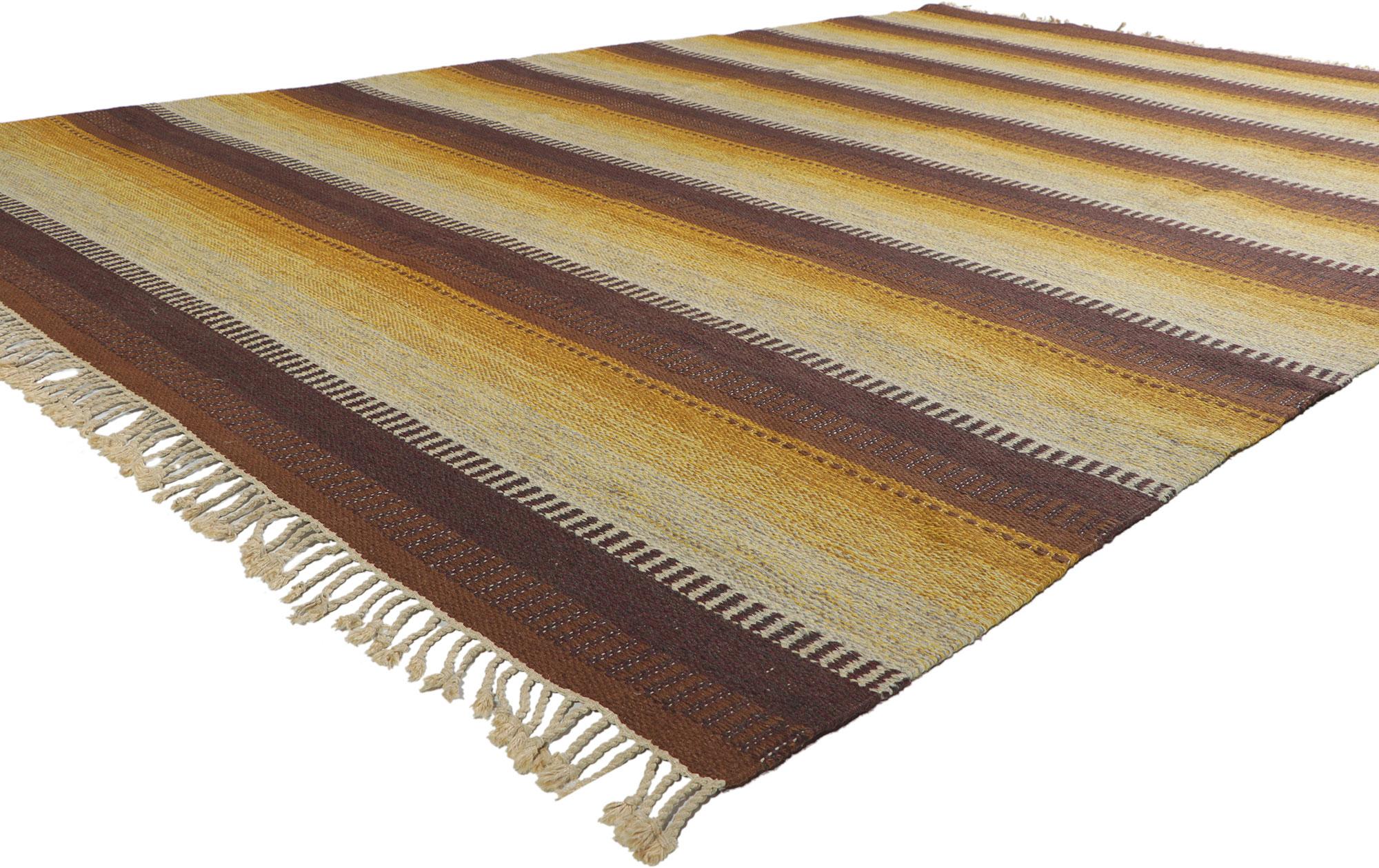 With its bold linear design, incredible detail and texture, this handwoven vintage Swedish kilim rug is a captivating vision of woven beauty. The eye-catching striped pattern and earthy colorway woven into this piece work together creating a truly