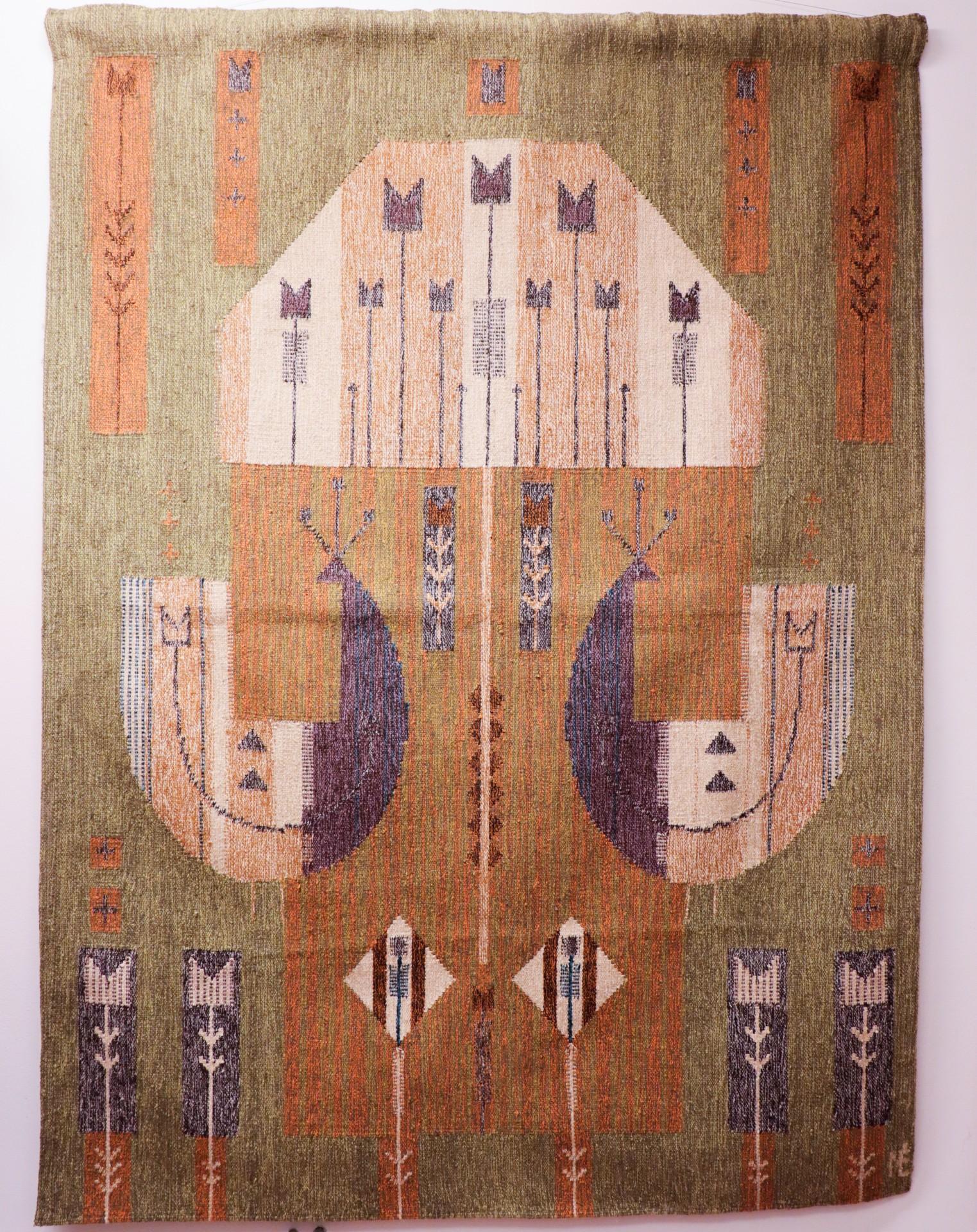 A lovely flatweave carpet designed by Éva Németh in Hungary around 1970s. It is 199 x 144 cm. It has a sewn meatus on the back to easily hang it on the wall (can also easily bee removed if you don´t want it, the stick will not be included. The