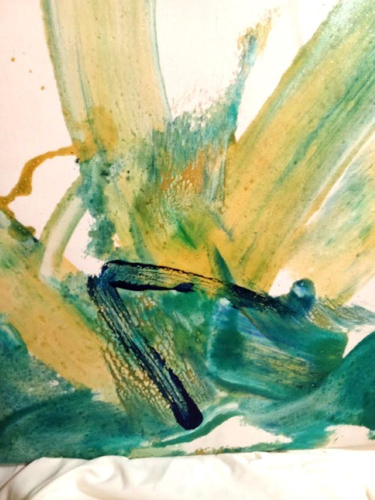 This abstract artwork features bold, sweeping brushstrokes in shades of teal and green, evoking a powerful sense of movement and fluidity. The dynamic swirls of paint create an impression of waves or wind, imparting an evocative oceanic theme. The