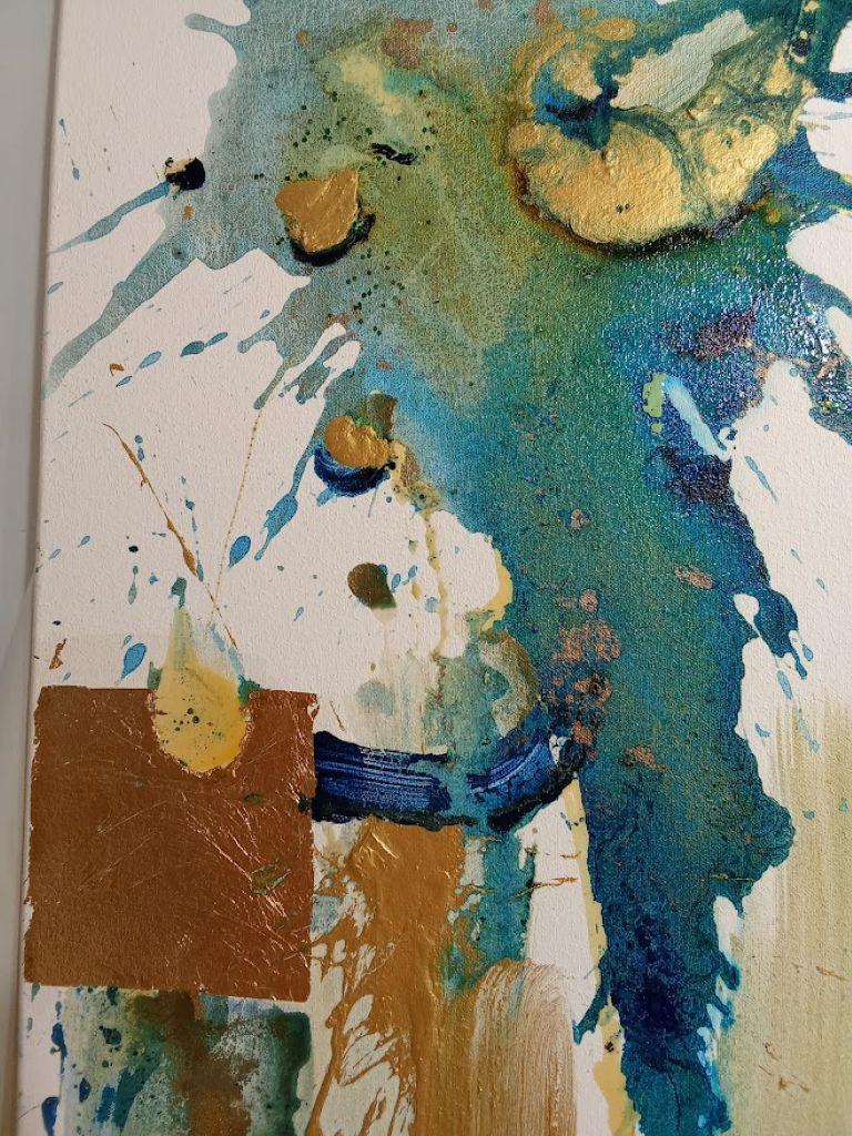 This artwork is an abstract masterpiece, striking with its dynamic composition and vivid colors. Dominated by bold splatters of teal and gold, it exudes an energetic and spontaneous aura. The upper left section features vibrant blue and green