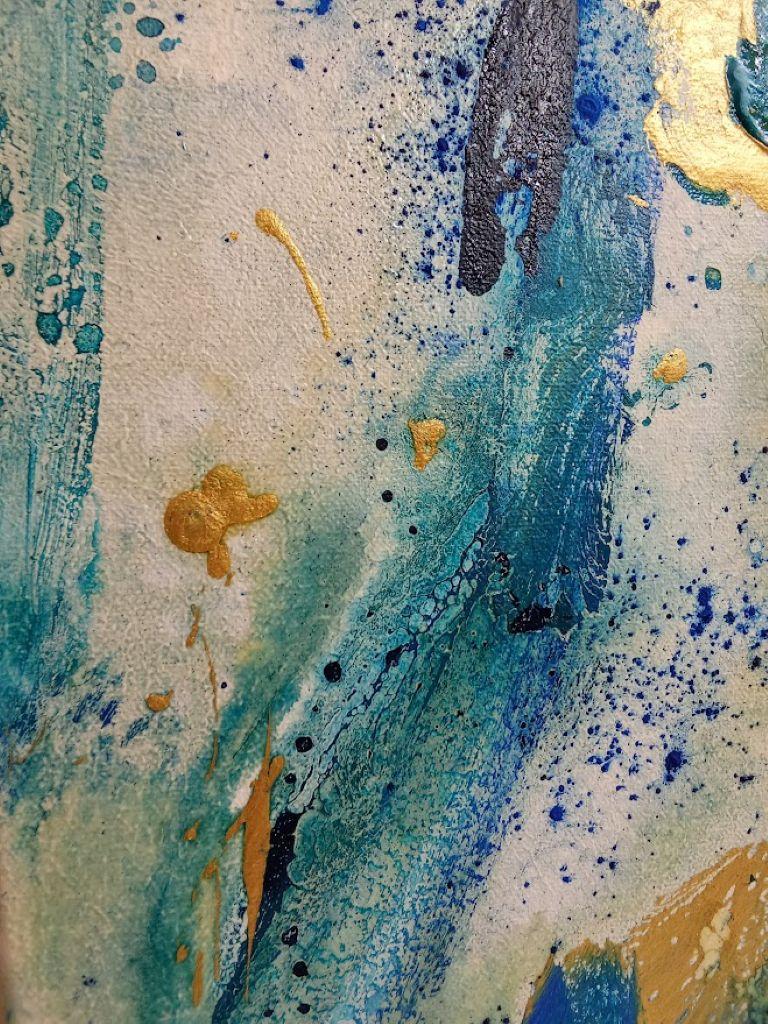 This artwork is an abstract composition that captivates with its dynamic interplay of color and texture. Dominated by bold strokes of deep blue and luminous gold, the painting exudes energy and fluidity. The blue appears both in broad sweeps and