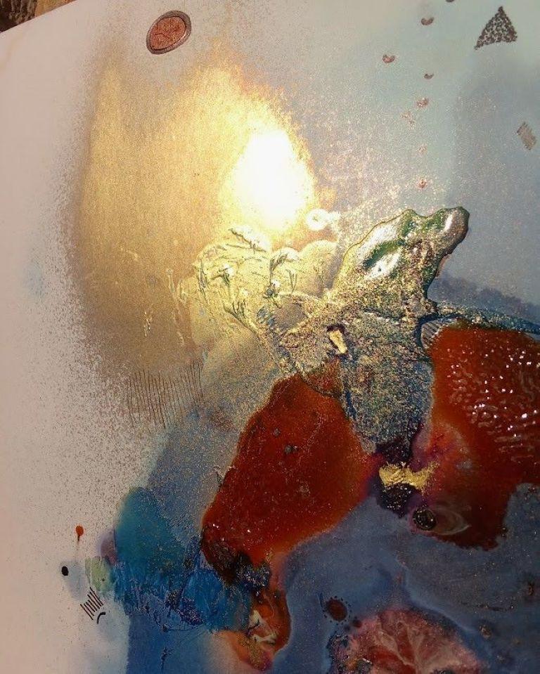 This artwork features an abstract composition, blending vibrant colors and textures on a subtle white backdrop. A dominant blue orb, centrally placed, creates a sense of depth and intrigue. Embellished with bursts of red and metallic elements, it