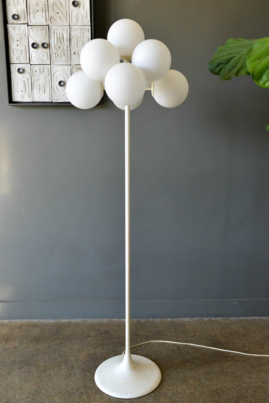 Eva Rene Nele Bode for Temde Leuchten Bubble Floor Lamp, 1965. Beautiful design with nine threaded blown glass globes on a cast aluminum base. Lamp is quite heavy and in very good original condition. White enameled base has some slight wear ash