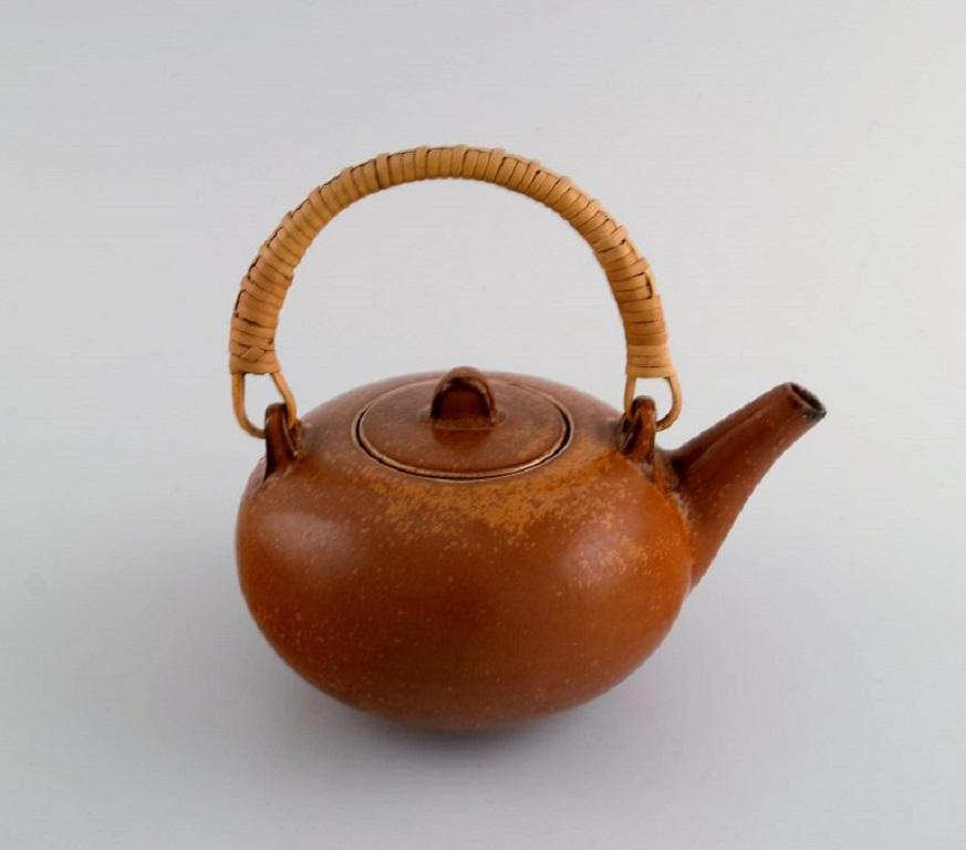 Scandinavian Modern Eva Stæhr-nielsen for Saxbo, Glazed Stoneware Teapot with Wicker Handle For Sale