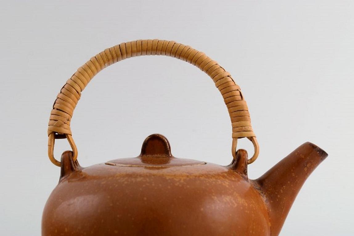 Danish Eva Stæhr-nielsen for Saxbo, Glazed Stoneware Teapot with Wicker Handle For Sale
