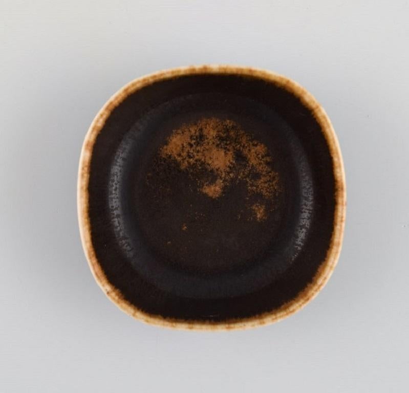 Eva Stæhr-Nielsen for Saxbo. Miniature bowl in glazed stoneware. 
Beautiful glaze in brown shades. Mid-20th century.
Measures: 7.5 x 2.5 cm.
Stamped.
In excellent condition.
