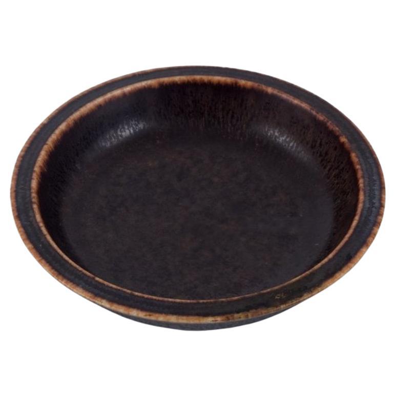 Eva Stæhr Nielsen for Saxbo, small ceramic bowl with glaze in brown tones For Sale