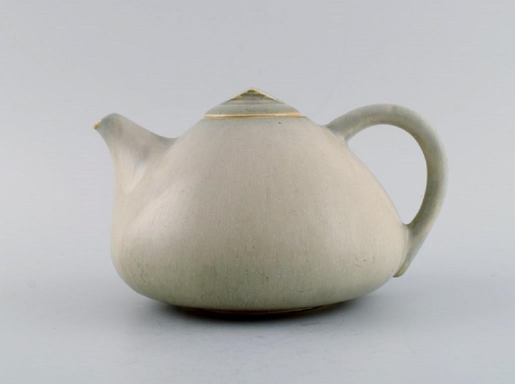 Eva Stæhr-Nielsen for Saxbo. Teapot in glazed stoneware. 
Mid-20th century.
Measures: 19.5 x 12 cm.
In excellent condition.
Stamped.