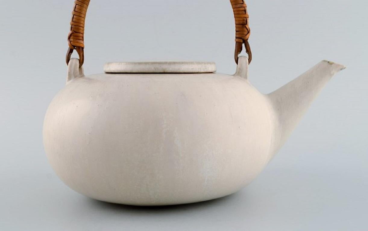 Eva Stæhr-nielsen for Saxbo, Teapot in Glazed Stoneware with a Wicker Handle In Excellent Condition In Copenhagen, DK