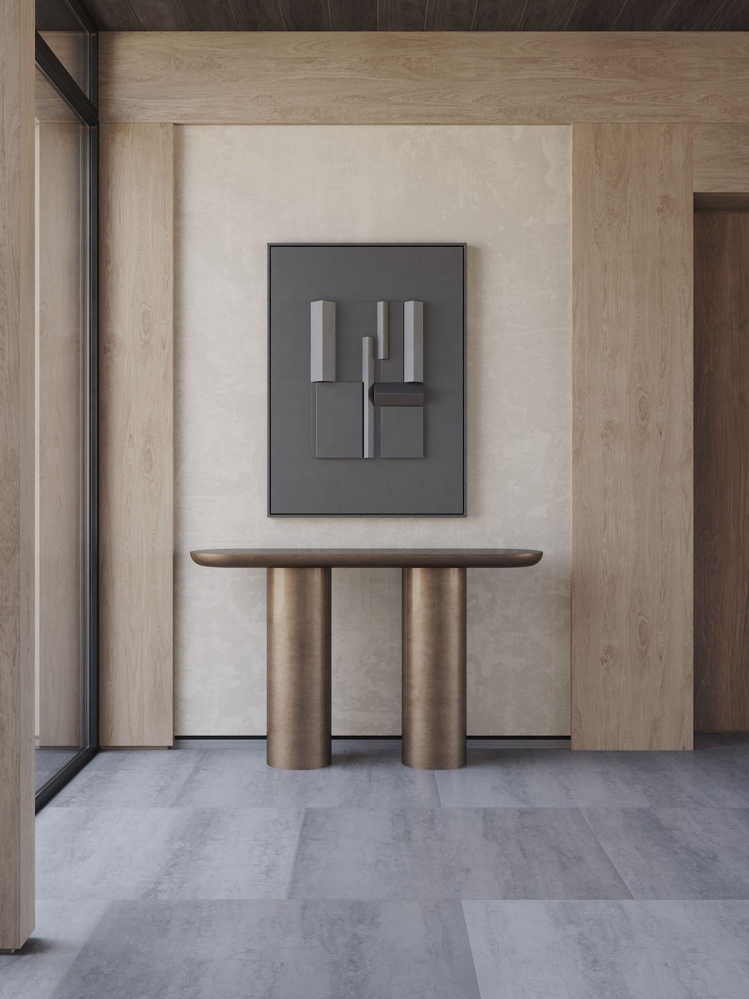 EVA console in Vintage Bronze metal effect finish: the rounded bold shape, impact view, soft touch, metal effect handmade paint.
